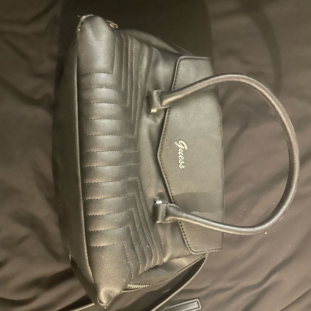 Black medium size four compartment guess purse